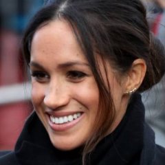 The Royal Reason Meghan Wears Her Hair in a Low Bun The Royal Reason Meghan Wears Her Hair in a Low Bun