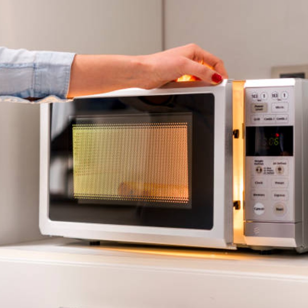 What Does That Mesh On The Inside Of Your Microwave Actually Do?